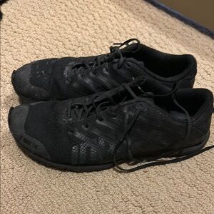 Inov-8 Black Athletic Shoes Sleek Design